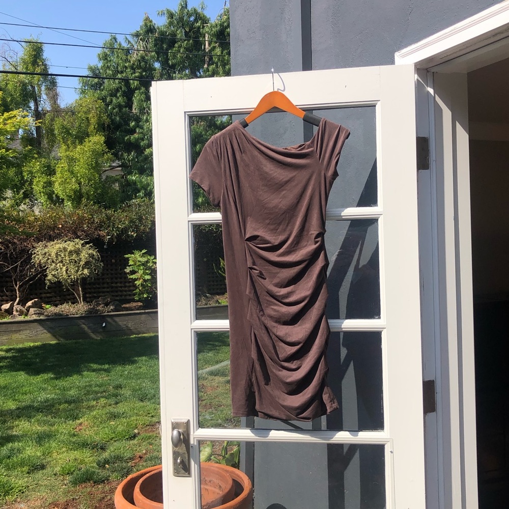 Feels and looks like suede.  Very flattering ON
